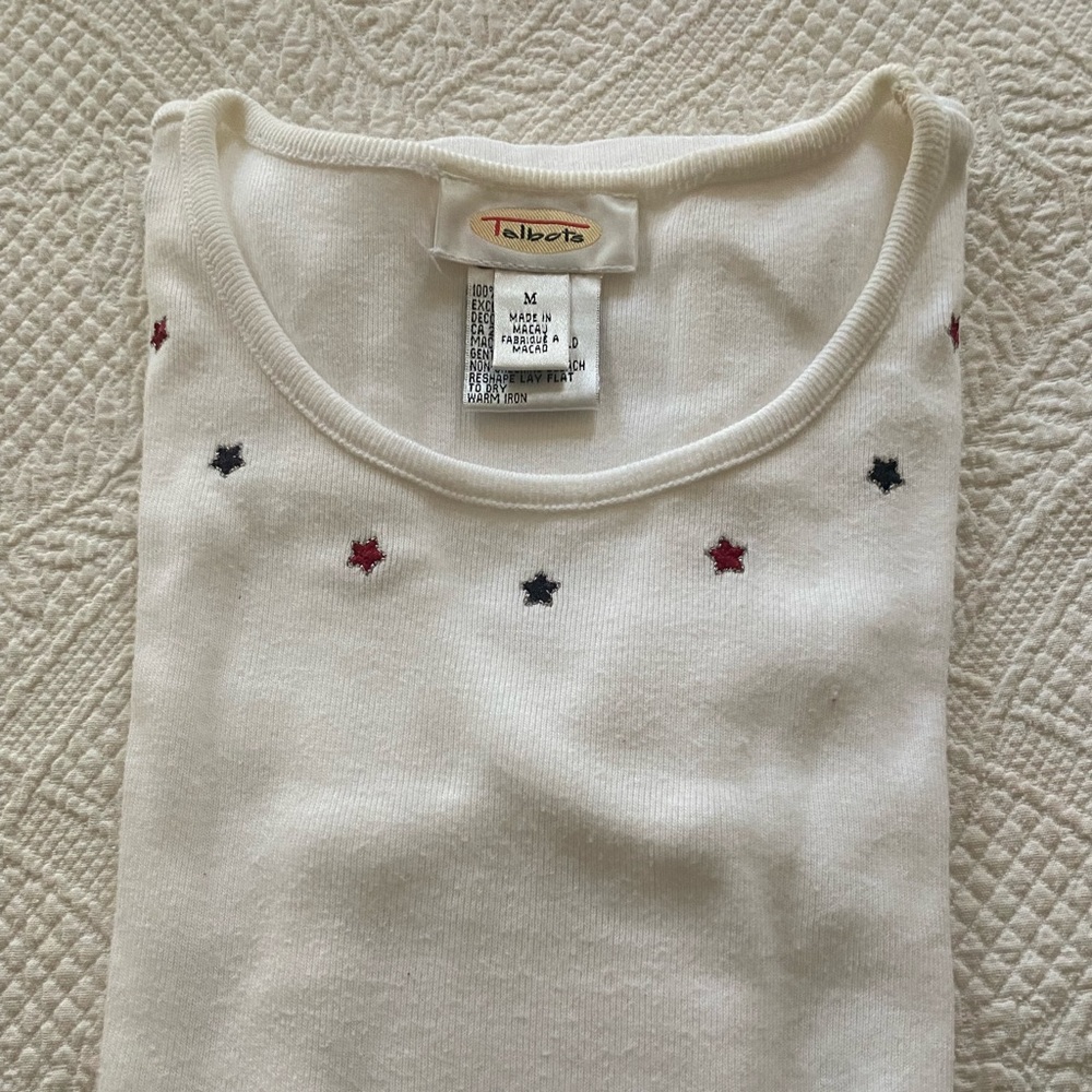 Talbots patriotic white knit top with red and blue stars.